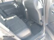 ✅ 2016 Jeep Patriot High Altitude • VIN: 1C4NJRFB3GD709556 • Lot: 41238260. Wystawiony na IAAI z przebiegiem 111 450 mil. Bezpłatny archiwum sprzedaży aukcyjnych z USA i szczegółowy raport historii pojazdu na DreamBid. Zdjęcie 8.