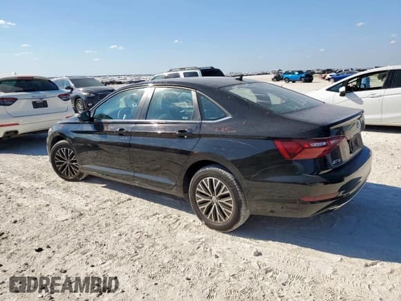 ✅ 2021 Volkswagen Jetta S • VIN: 3VWC57BU0MM051215 • Lot: 82378175. Listed on Copart with 186,304 mi. Free auction sales archive from the USA and detailed vehicle history report at DreamBid. Image 2.