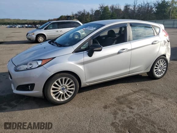 ✅ 2014 Ford Fiesta Titanium • VIN: 3FADP4FJ7EM179572 • Лот: 80505475. Опубликован ранее на Copart с пробегом 186 633 миль. Бесплатный доступ к архиву аукционных продаж из США и подробный отчёт об истории автомобиля на DreamBid. Изображение 1.