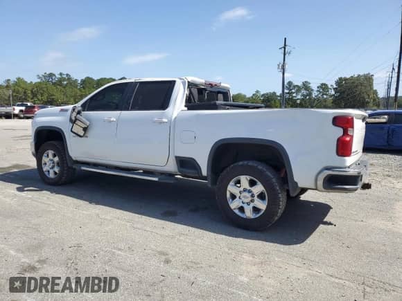 2020 Chevrolet Silverado 2500HD LT с VIN 1GC1YNEY0LF312328, выставлен на аукционе Copart как лот 84876165 с пробегом 84 905 миль миль и Списание • Salvage title. История ставок и продаж доступна на DreamBid. Изображение 2.