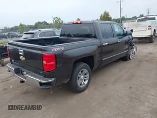 ✅ 2015 Chevrolet Silverado 1500 LT • VIN: 3GCUKREC9FG412201 • Lot: 43291126. Wystawiony na IAAI z przebiegiem 141 513 mil. Bezpłatny archiwum sprzedaży aukcyjnych z USA i szczegółowy raport historii pojazdu na DreamBid. Zdjęcie 4.
