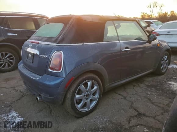 ✅ 2010 MINI Convertible • VIN: WMWMR3C59ATU97143 • Lot: 94448275. Listed on Copart with 73,173 mi. Free auction sales archive from the USA and detailed vehicle history report at DreamBid. Image 3.