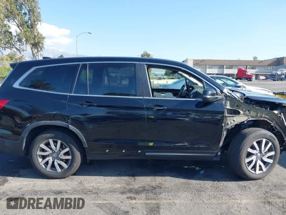✅ 2019 Honda Pilot EX-L • VIN: 5FNYF5H58KB044315 • Lot: 43127518. Listed on IAAI with 63,216 mi. Free auction sales archive from the USA and detailed vehicle history report at DreamBid. Image 18.