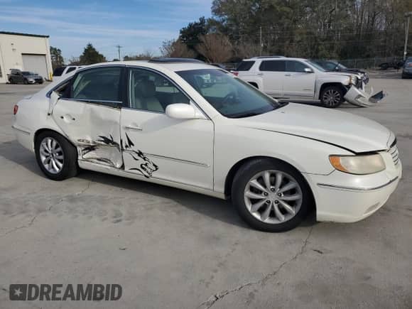 2006 Hyundai Azera SE с VIN KMHFC46F66A128343, выставлен на аукционе Copart как лот 83447424 с пробегом 274 218 миль миль и Списание • Salvage title. История ставок и продаж доступна на DreamBid. Изображение 4.