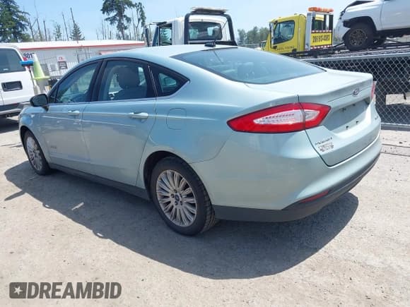 ✅ 2014 Ford Fusion S Hybrid • VIN: 3FA6P0UU3ER220717 • Lot: 42495849. Wystawiony na IAAI z przebiegiem 148 208 mil. Bezpłatny archiwum sprzedaży aukcyjnych z USA i szczegółowy raport historii pojazdu na DreamBid. Zdjęcie 3.