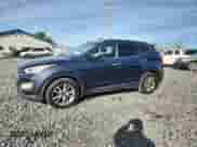 ✅ 2015 Hyundai Santa Fe • VIN: 5XYZUDLA7FG285886 • Лот: 90075335. Опубликован ранее на Copart с пробегом 211 802 миль. Бесплатный доступ к архиву аукционных продаж из США и подробный отчёт об истории автомобиля на DreamBid. Изображение 1.