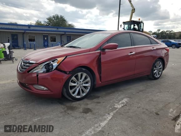 ✅ 2013 Hyundai Sonata SE • VIN: 5NPEC4AC1DH573589 • Lot: 74302984. Listed on Copart with 132,069 mi. Free auction sales archive from the USA and detailed vehicle history report at DreamBid. Image 1.