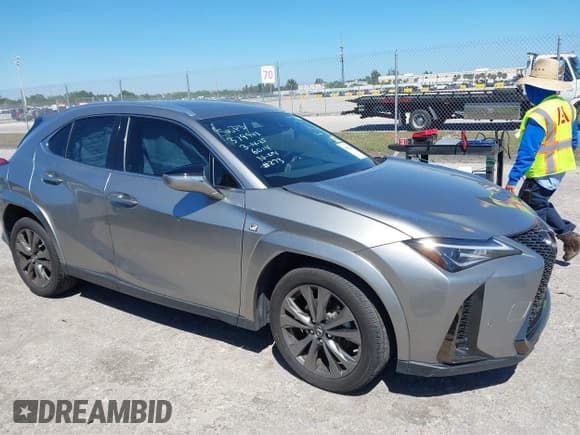 ✅ 2022 Lexus UX 200 F Sport • VIN: JTHE3JBH3N2056014 • Лот: 41832434. Опубликован ранее на IAAI с пробегом 25 693 миль. Бесплатный доступ к архиву аукционных продаж из США и подробный отчёт об истории автомобиля на DreamBid. Изображение 1.