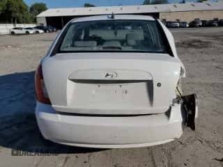 2006 Hyundai Accent GLS z VIN KMHCN46C36U009585, wystawiony jako Copart lot #74067284 z przebiegiem 140 696 mil mil oraz Nie do naprawy • Non repairable. Historia ofert i sprzedaży dostępna na DreamBid. Obrazek 6.