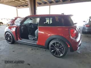 2014 MINI Hardtop S with VIN WMWXM7C56ET988018, listed as a Copart auction lot 64136785 with 73,870 mi miles and Salvage title. Bid and sale history available at DreamBid. Image 2.
