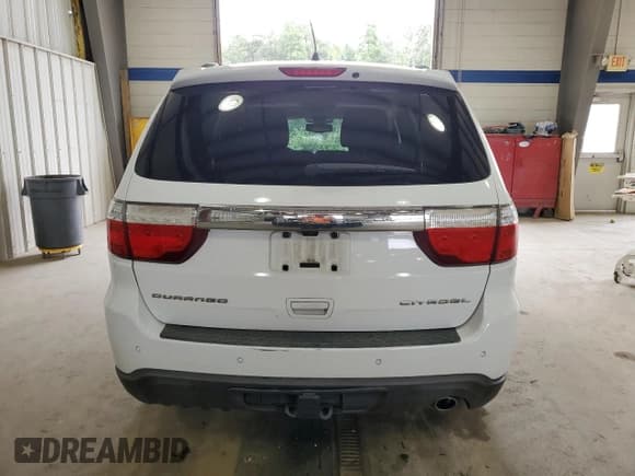 ✅ 2013 Dodge Durango Citadel • VIN: 1C4RDHEG0DC571766 • Лот: 69609015. Опубликован ранее на Copart с пробегом 124 592 миль. Бесплатный доступ к архиву аукционных продаж из США и подробный отчёт об истории автомобиля на DreamBid. Изображение 6.