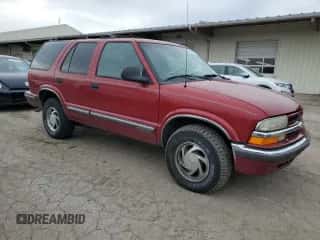 1998 Chevrolet Blazer LT with VIN 1GNDT13W1W2261382, listed as a Copart auction lot 80436974 with 145,348 mi miles and Salvage title. Bid and sale history available at DreamBid. Image 4.