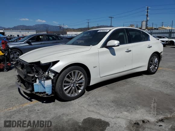 ✅ 2018 Infiniti Q50 Luxe • VIN: JN1EV7APXJM353936 • Lot: 56296925. Listed on Copart with 57,544 mi. Free auction sales archive from the USA and detailed vehicle history report at DreamBid. Image 1.