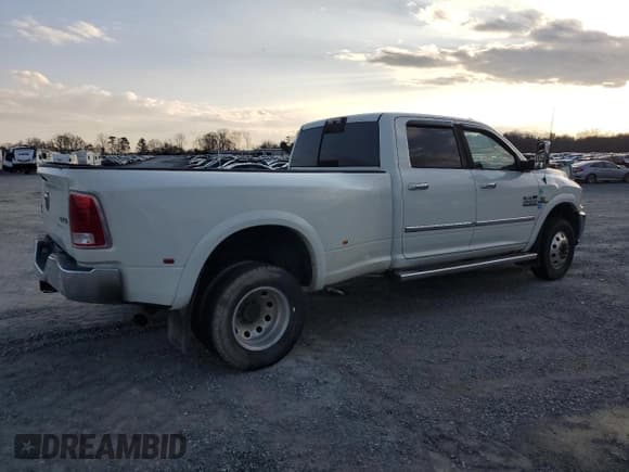 ✅ 2016 Ram 3500 Laramie • VIN: 3C63RRJL1GG208661 • Lot: 43552305. Listed on Copart with 217,077 mi. Free auction sales archive from the USA and detailed vehicle history report at DreamBid. Image 3.