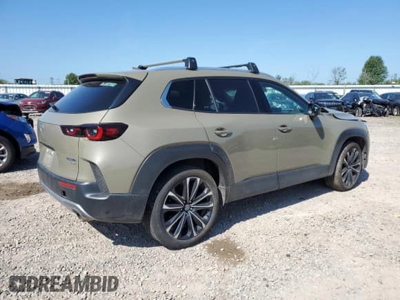 ✅ 2024 Mazda CX-50 Premium • VIN: 7MMVABDY8RN159332 • Lot: 67999815. Wystawiony na Copart z przebiegiem 22 838 mil. Bezpłatny archiwum sprzedaży aukcyjnych z USA i szczegółowy raport historii pojazdu na DreamBid. Zdjęcie 3.