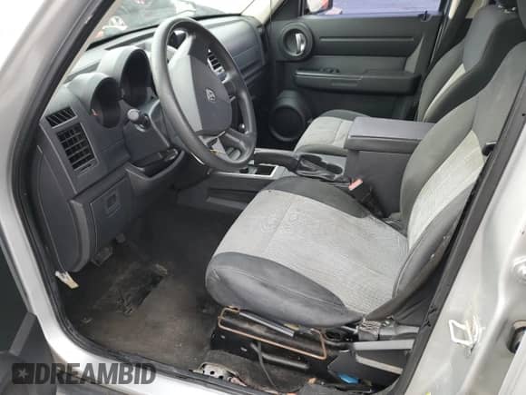 2007 Dodge Nitro SXT с VIN 1D8GU28K47W580088, выставлен на аукционе Copart как лот 80461184 с пробегом 194 480 миль миль и Списание • Salvage title. История ставок и продаж доступна на DreamBid. Изображение 7.