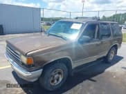 ✅ 1991 Ford Explorer Eddie Bauer • VIN: 1FMDU32XXMUB21131 • Lot: 42752159. Listed on IAAI with 391,064 mi. Free auction sales archive from the USA and detailed vehicle history report at DreamBid. Image 2.