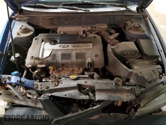 2005 Hyundai Elantra GLS z VIN KMHDN46D05U186414, wystawiony jako Copart lot #82921324 z przebiegiem 141 258 mil mil oraz Szkoda całkowita • Salvage title. Historia ofert i sprzedaży dostępna na DreamBid. Obrazek 11.