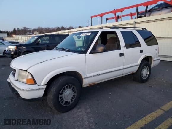 ✅ 1998 GMC Jimmy SLS • VIN: 1GKDT13W9W2506846 • Lot: 84854964. Listed on Copart with 151,051 mi. Free auction sales archive from the USA and detailed vehicle history report at DreamBid. Image 1.
