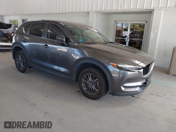 ✅ 2019 Mazda CX-5 Touring • VIN: JM3KFACM4K0616211 • Лот: 43607311. Опубликован ранее на IAAI с пробегом 57 523 миль. Бесплатный доступ к архиву аукционных продаж из США и подробный отчёт об истории автомобиля на DreamBid. Изображение 1.
