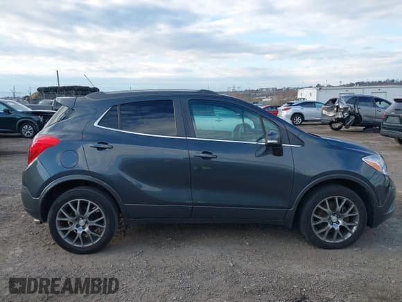 ✅ 2016 Buick Encore Sport Touring • VIN: KL4CJ2SM6GB674684 • Lot: 43552741. Wystawiony na IAAI z przebiegiem 138 488 mil. Bezpłatny archiwum sprzedaży aukcyjnych z USA i szczegółowy raport historii pojazdu na DreamBid. Zdjęcie 13.