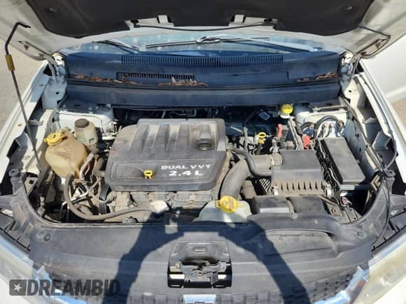 2012 Dodge Journey American Value z VIN 3C4PDCAB9CT353221, wystawiony jako Copart lot #83983955 z przebiegiem 312 681 mil mil oraz Szkoda całkowita • Salvage title. Historia ofert i sprzedaży dostępna na DreamBid. Obrazek 12.