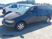 ✅ 2004 Honda Odyssey EX-L • VIN: 5FNRL18074B062589 • Лот: 42843067. Опубликован ранее на IAAI с пробегом 233 515 миль. Бесплатный доступ к архиву аукционных продаж из США и подробный отчёт об истории автомобиля на DreamBid. Изображение 2.