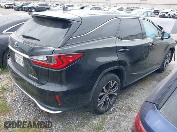 ✅ 2022 Lexus RX 350L • VIN: JTJHZKFA8N2038704 • Lot: 41892583. Listed on IAAI with 35,565 mi. Free auction sales archive from the USA and detailed vehicle history report at DreamBid. Image 4.
