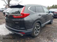 ✅ 2019 Honda CR-V Touring • VIN: 2HKRW2H99KH602129 • Lot: 43855817. Listed on IAAI with 91,135 mi. Free auction sales archive from the USA and detailed vehicle history report at DreamBid. Image 4.