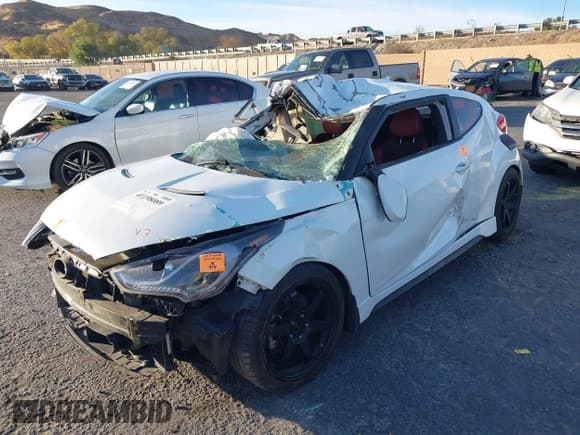 ✅ 2014 Hyundai Veloster Turbo • VIN: KMHTC6AE0EU200518 • Lot: 41198089. Wystawiony na IAAI z przebiegiem Nie podano. Bezpłatny archiwum sprzedaży aukcyjnych z USA i szczegółowy raport historii pojazdu na DreamBid. Zdjęcie 2.