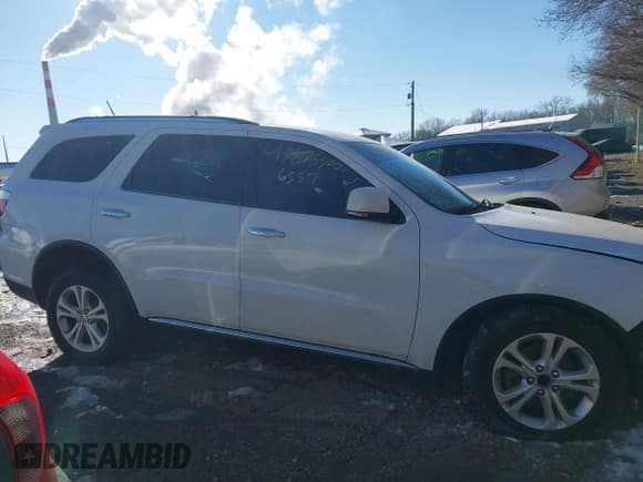 ✅ 2013 Dodge Durango Crew • VIN: 1C4RDJDG4DC665092 • Lot: 43873500. Listed on IAAI with 141,905 mi. Free auction sales archive from the USA and detailed vehicle history report at DreamBid. Image 13.