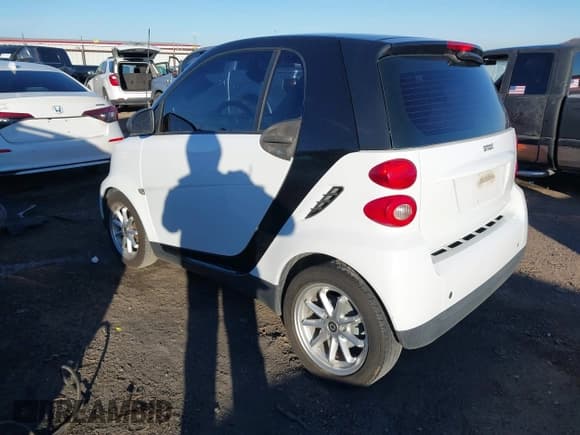 ✅ 2009 Smart fortwo Pure • VIN: WMEEJ31X99K292492 • Lot: 41029051. Listed on IAAI with 57,741 mi. Free auction sales archive from the USA and detailed vehicle history report at DreamBid. Image 3.