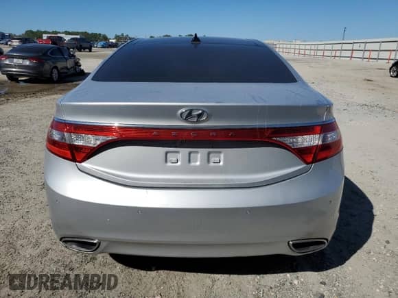 2013 Hyundai Azera с VIN KMHFH4JG2DA273958, выставлен на аукционе Copart как лот 47372205 с пробегом 98 264 миль миль и Списание • Salvage title. История ставок и продаж доступна на DreamBid. Изображение 6.