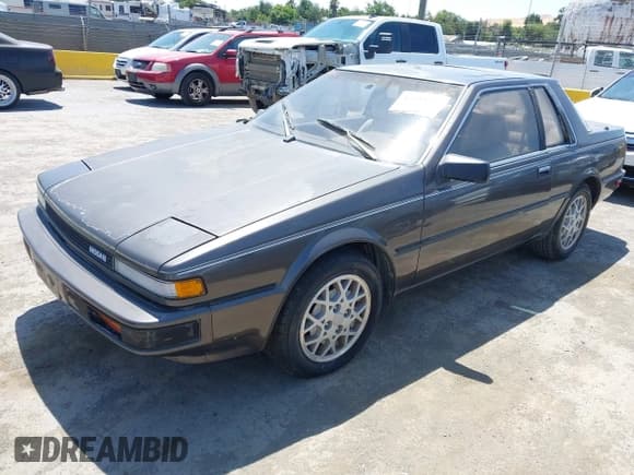 ✅ 1986 Nissan 200SX • VIN: JN1PS24S7GW112725 • Лот: 42533555. Опубликован ранее на IAAI с пробегом 74 240 миль. Бесплатный доступ к архиву аукционных продаж из США и подробный отчёт об истории автомобиля на DreamBid. Изображение 2.