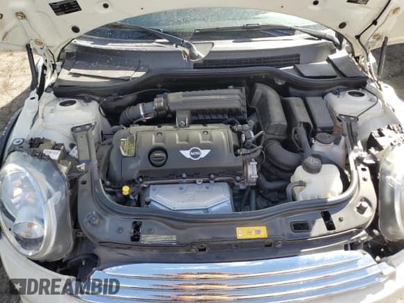 ✅ 2014 MINI Convertible • VIN: WMWZN3C59ET569823 • Лот: 72543194. Опубликован ранее на Copart с пробегом 56 730 миль. Бесплатный доступ к архиву аукционных продаж из США и подробный отчёт об истории автомобиля на DreamBid. Изображение 11.