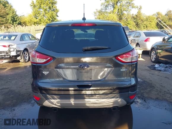 ✅ 2016 Ford Escape SE • VIN: 1FMCU9GX4GUC20913 • Lot: 43420226. Listed on IAAI with 112,669 mi. Free auction sales archive from the USA and detailed vehicle history report at DreamBid. Image 16.