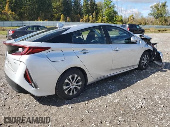 ✅ 2021 Toyota Prius XLE • VIN: JTDKAMFP8M3173660 • Lot: 82497595. Listed on Copart with 72,368 mi. Free auction sales archive from the USA and detailed vehicle history report at DreamBid. Image 3.