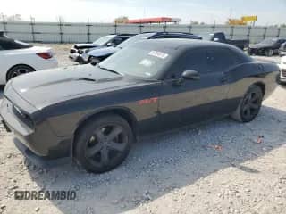 2014 Dodge Challenger R/T z VIN 2C3CDYBT1EH249826, wystawiony jako Copart lot #80354575 z przebiegiem Nie podano mil oraz Szkoda całkowita • Salvage title. Historia ofert i sprzedaży dostępna na DreamBid. Obrazek 1.