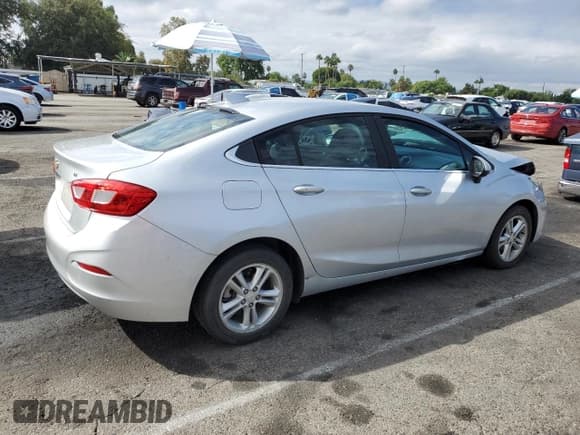 ✅ 2016 Chevrolet Cruze LT • VIN: 1G1BE5SM0G7291276 • Lot: 81564985. Listed on Copart with 122,061 mi. Free auction sales archive from the USA and detailed vehicle history report at DreamBid. Image 3.