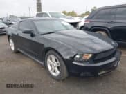 ✅ 2012 Ford Mustang Premium • VIN: 1ZVBP8AM4C5222131 • Lot: 43519035. Listed on IAAI with 124,983 mi. Free auction sales archive from the USA and detailed vehicle history report at DreamBid. Image 1.