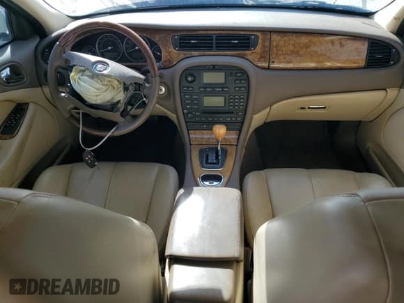 ✅ 2005 Jaguar S-Type • VIN: SAJWA01T95FN43966 • Лот: 76370414. Опубликован ранее на Copart с пробегом 72 350 миль. Бесплатный доступ к архиву аукционных продаж из США и подробный отчёт об истории автомобиля на DreamBid. Изображение 8.