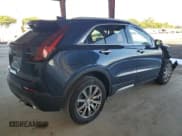 ✅ 2021 Cadillac XT4 FWD Premium Luxury • VIN: 1GYFZCR43MF055272 • Lot: 86995405. Listed on Copart with 25,531 mi. Free auction sales archive from the USA and detailed vehicle history report at DreamBid. Image 3.