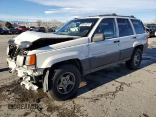 ✅ 1998 Jeep Grand Cherokee Laredo • VIN: 1J4GZ58YXWC134866 • Lot: 84514074. Listed on Copart with 193,802 mi. Free auction sales archive from the USA and detailed vehicle history report at DreamBid. Image 1.
