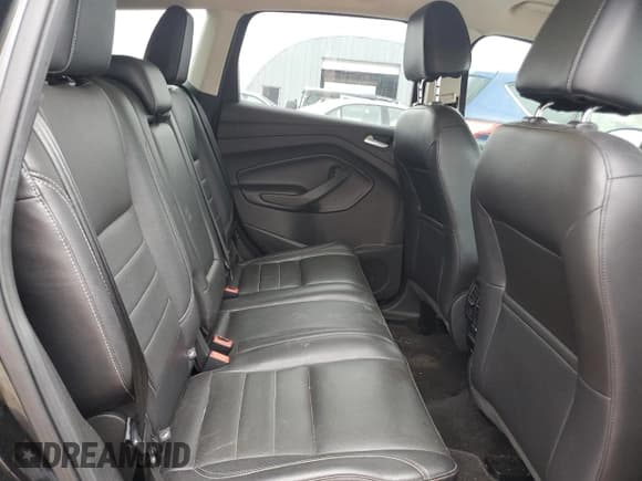 ✅ 2016 Ford Escape Titanium • VIN: 1FMCU0J93GUB37009 • Lot: 70944035. Wystawiony na Copart z przebiegiem 96 360 mil. Bezpłatny archiwum sprzedaży aukcyjnych z USA i szczegółowy raport historii pojazdu na DreamBid. Zdjęcie 11.