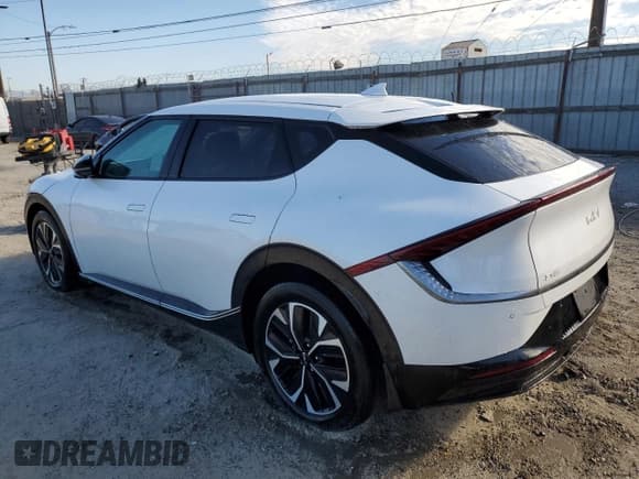 ✅ 2024 Kia EV6 Wind • VIN: KNDC34LA9R5169174 • Lot: 85860215. Wystawiony na Copart z przebiegiem 59 034 mil. Bezpłatny archiwum sprzedaży aukcyjnych z USA i szczegółowy raport historii pojazdu na DreamBid. Zdjęcie 2.