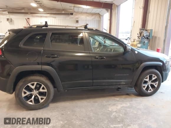 ✅ 2014 Jeep Cherokee Trailhawk • VIN: 1C4PJMBB1EW104938 • Лот: 43736578. Опубликован ранее на IAAI с пробегом 184 413 миль. Бесплатный доступ к архиву аукционных продаж из США и подробный отчёт об истории автомобиля на DreamBid. Изображение 13.