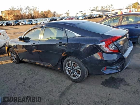 ✅ 2016 Honda Civic LX • VIN: 19XFC2F56GE213911 • Lot: 93831415. Listed on Copart with 79,869 mi. Free auction sales archive from the USA and detailed vehicle history report at DreamBid. Image 2.