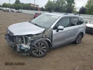 2017 Subaru Forester Premium with VIN JF2SJGECXHH537197, listed as a Copart auction lot 70521415 with 105,322 mi miles and Salvage title. Bid and sale history available at DreamBid. Image 1.