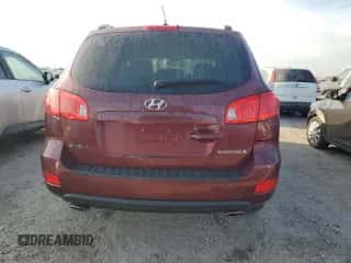 2009 Hyundai Santa Fe Limited z VIN 5NMSH13E79H270144, wystawiony jako Copart lot #74977124 z przebiegiem Nie podano mil oraz Szkoda całkowita • Salvage title. Historia ofert i sprzedaży dostępna na DreamBid. Obrazek 6.