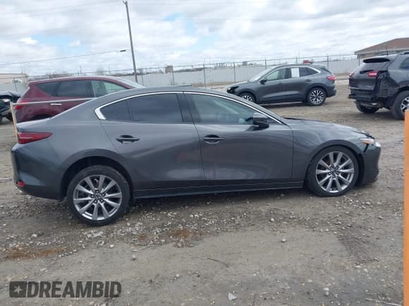 ✅ 2019 Mazda 3 Premium • VIN: 3MZBPAEM1KM104189 • Lot: 42012587. Listed on IAAI with 60,727 mi. Free auction sales archive from the USA and detailed vehicle history report at DreamBid. Image 14.
